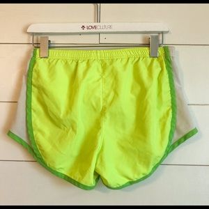 neon green running shorts